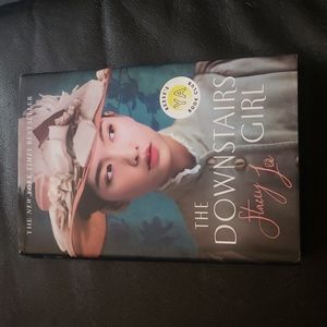 📚 The Downstairs Girl hardcover book